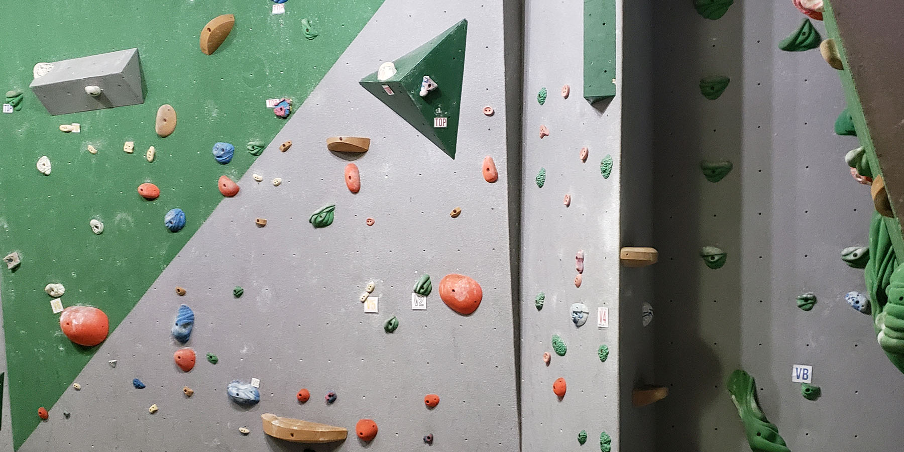 Indoor climbing wall with a wide variety of holds designed and built by ABEE Inc. in Norway, Michigan.